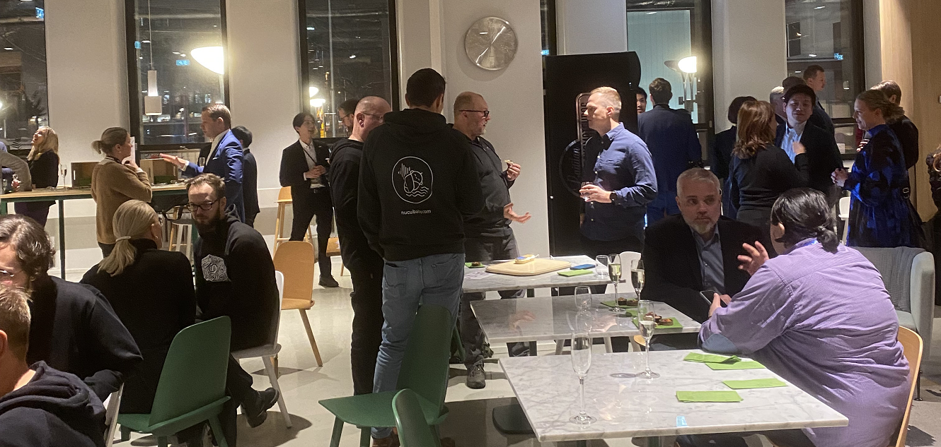Networking at the BusinessOulu Slush side-event in 2023