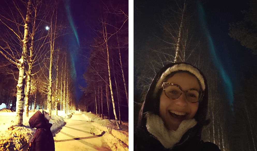Woman smiling at the front of northers lights