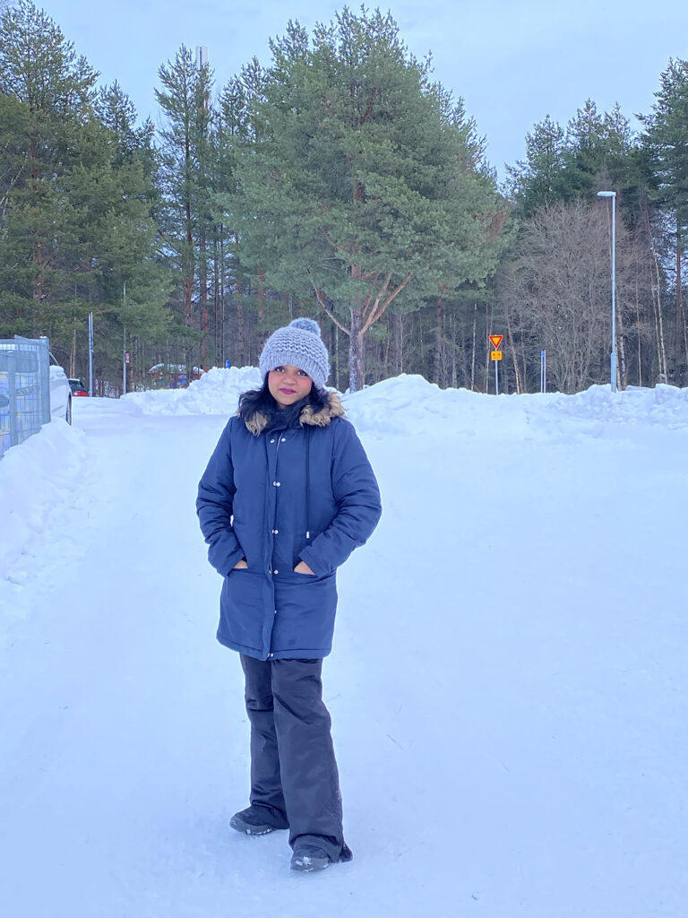 Woman wearing winter clothes in Oulu