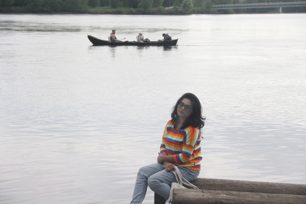 Woman by the Oulu river
