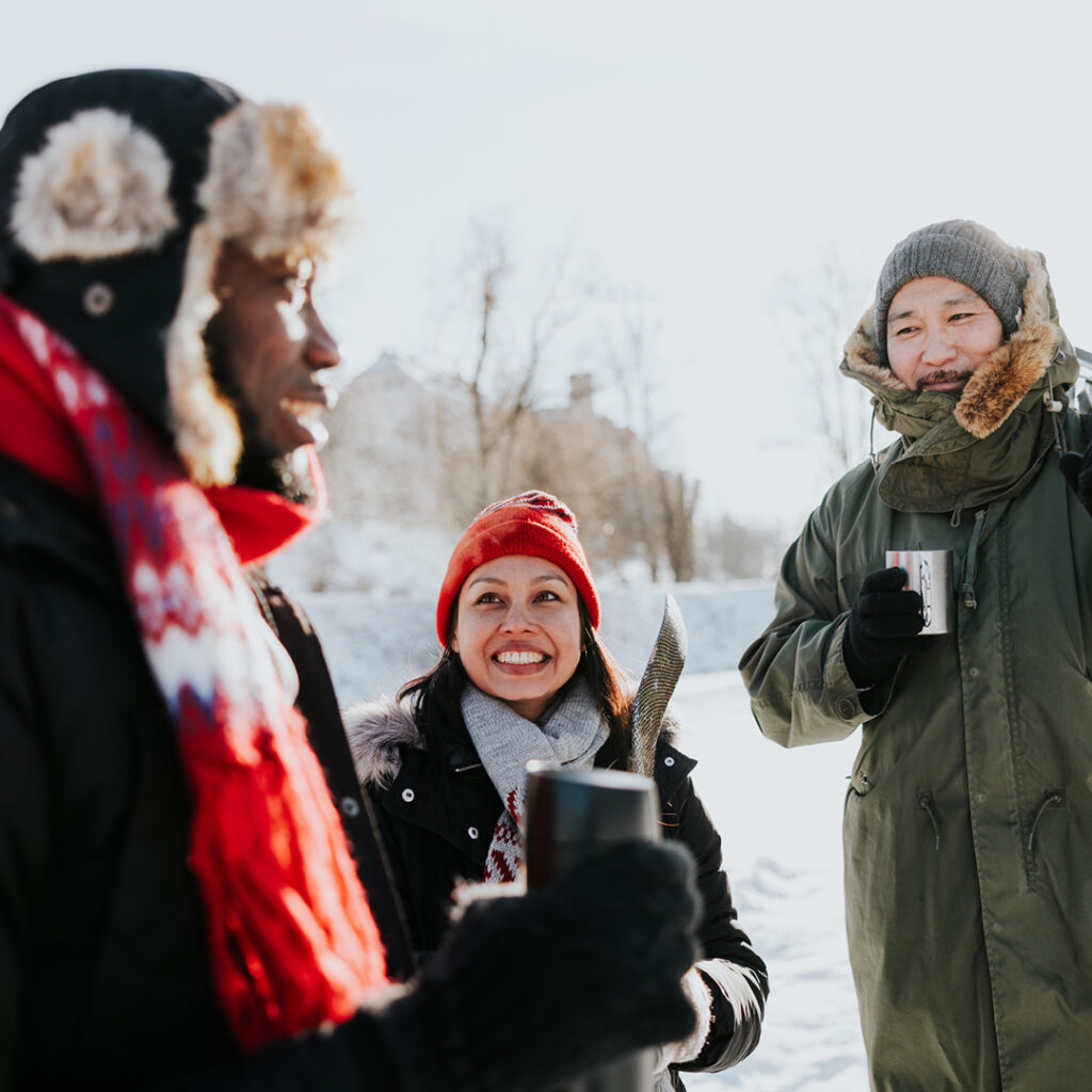 3 people having fun at Finnish winter