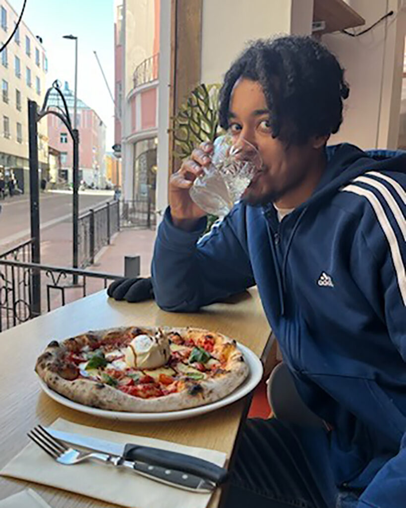 Shakeel Mehmet, man eating pizza